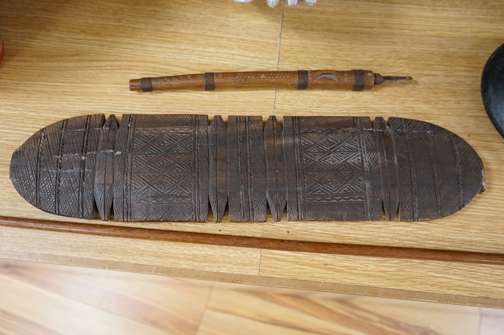South Sea Islands and African tribal carved pot, knife sheath, stick and carved paddle-53cm long